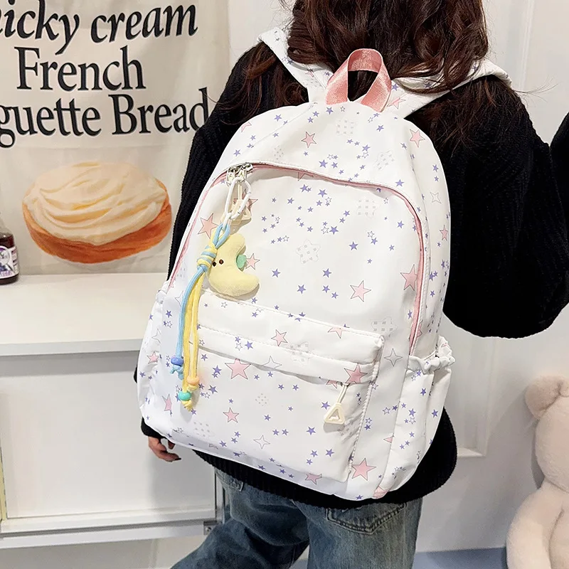 Kawaii Star Pattern Backpack for Teen Girls Lightweight Student School Bag with Cute Moon Charm Daily Casual Rucksack