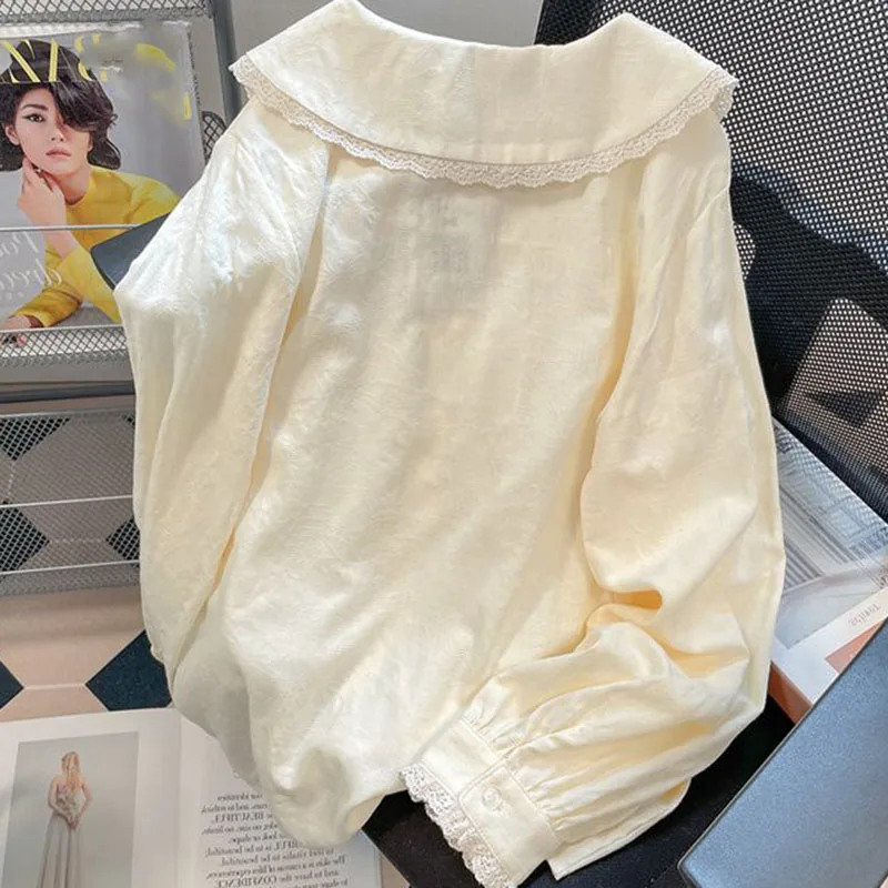 เสื้อเชิ้ตคอปีเตอร์แพนสไตล์ญี่ปุ่นน่ารักสำหรับผู้หญิง เสื้อแขนยาวผูกโบว์หวานๆ เสื้อทรงหลวมติดกระดุม เข้าได้กับทุกชุด สไตล์ Y2k