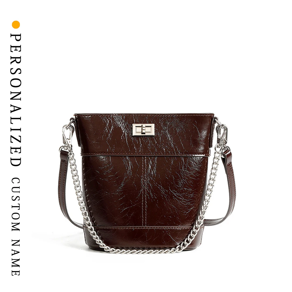 

Oil wax head layer cowhide fashionable light luxury bag for women simple mobile phone change bucket bag free customized letters
