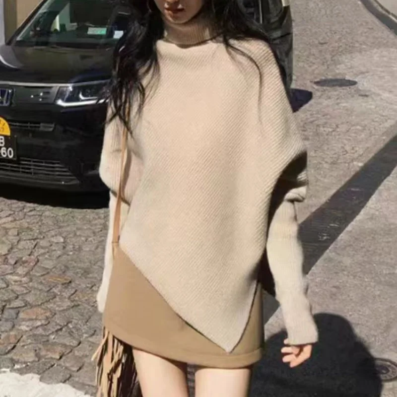 Autumn and winter 100% pure wool sweater design sense turtleneck bat sleeve sweater women's loose irregular cloak knitwear