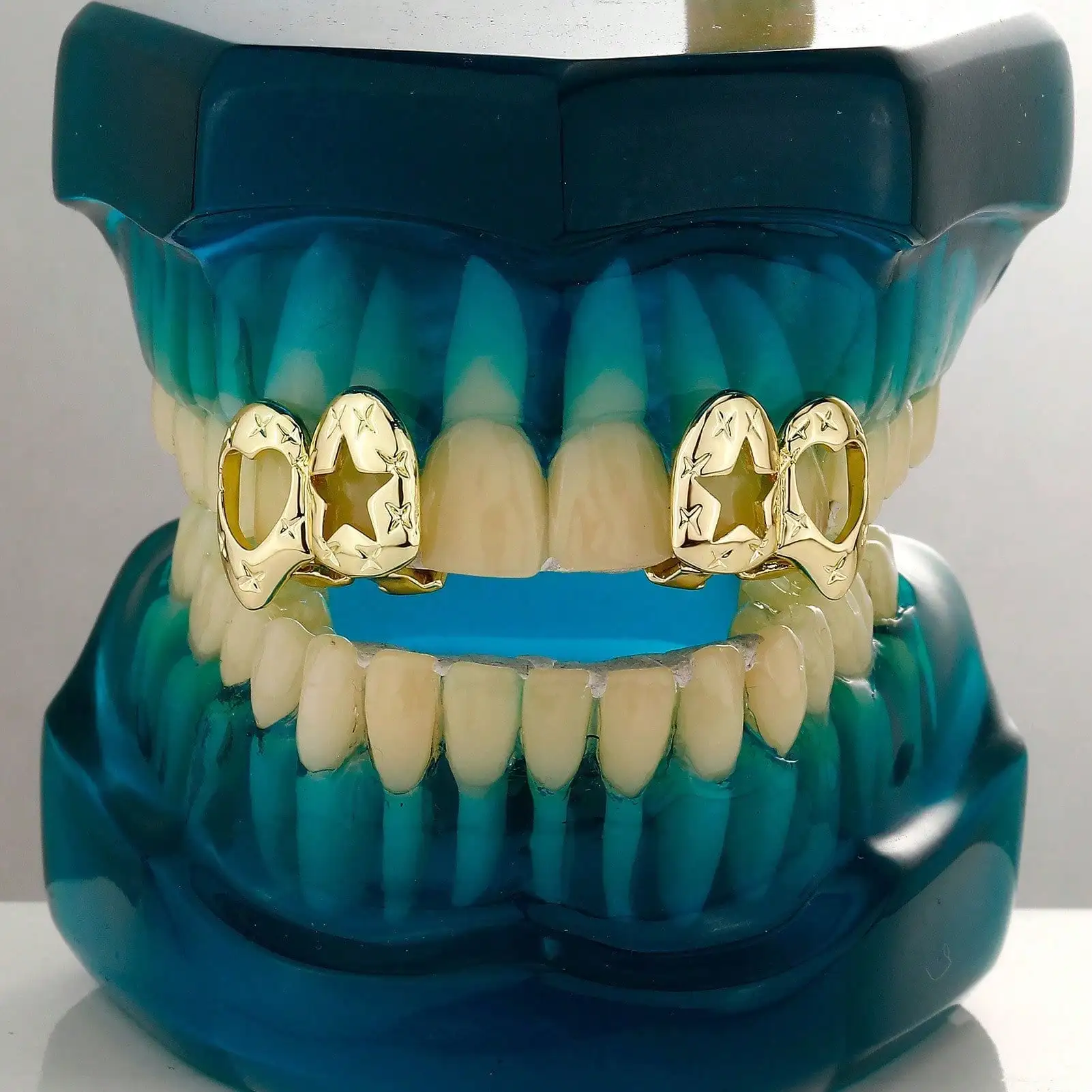 

1Set Gold Plated Hollow Teeth Grills 4 Tooth Cap Hip Hop Punk Dental Jewelry for Men Women Fashion Accessory