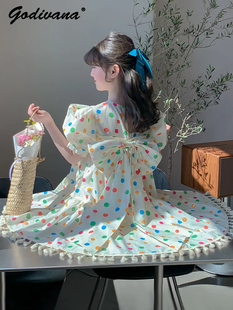 Sweet Girls 2026 New Summer Princess Dress Kids Cute Polka Dot Puff Sleeve Back Bow Tassel Hem Loose Breathable Casual Dresses