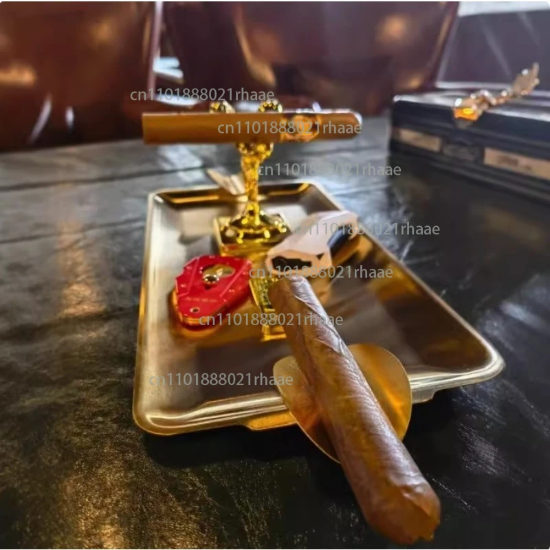 

Golden statuette ashtray, Rolls cigar jar, eggplant jar, gold silver retro ornament, bar club ornament.