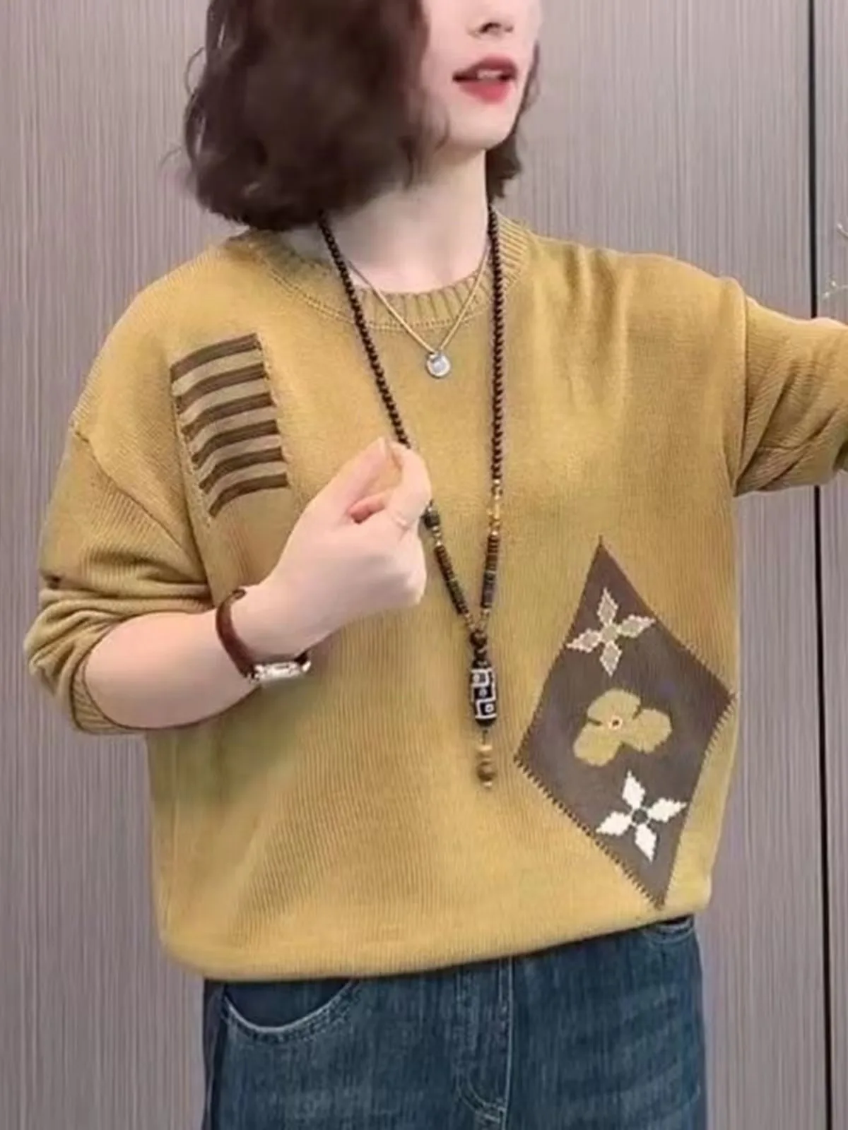 เสื้อสเวตเตอร์ถักทรงหลวมสำหรับผู้หญิง คอกลม ลายดอกไม้  สำหรับฤดูใบไม้ร่วงและฤดูหนาว  รุ่นใหม่  ช่วยให้ดูผอมลง