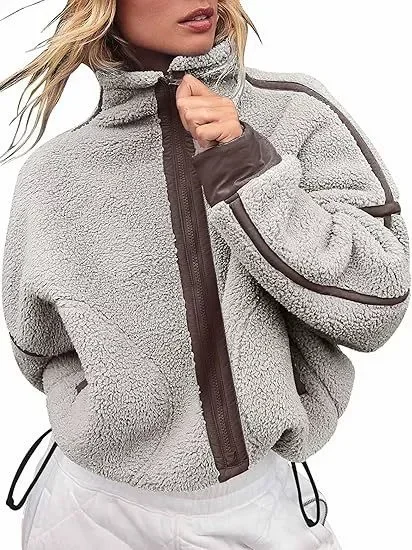 Damen-Fleecejacke mit durchgehendem Reißverschluss, weißem Kontraststreifen, Stehkragen, langen Ärmeln, Kordelzug am Saum, lockerer Schnitt, warme Winterjacke. – Detail 6