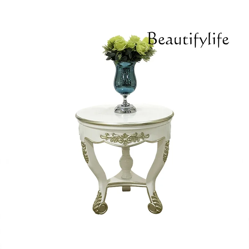 

French solid wood small round coffee table European luxury living room corner few carved sofa next to small round storage table