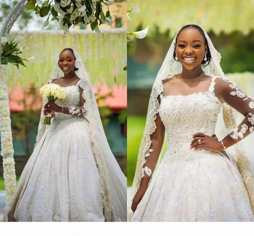 

Customized African Sexy Gold Lace Appliqued A-line Wedding Dress Long Sleeves Luxury Black Girl Beaded Plus Size Bridal Gown 202