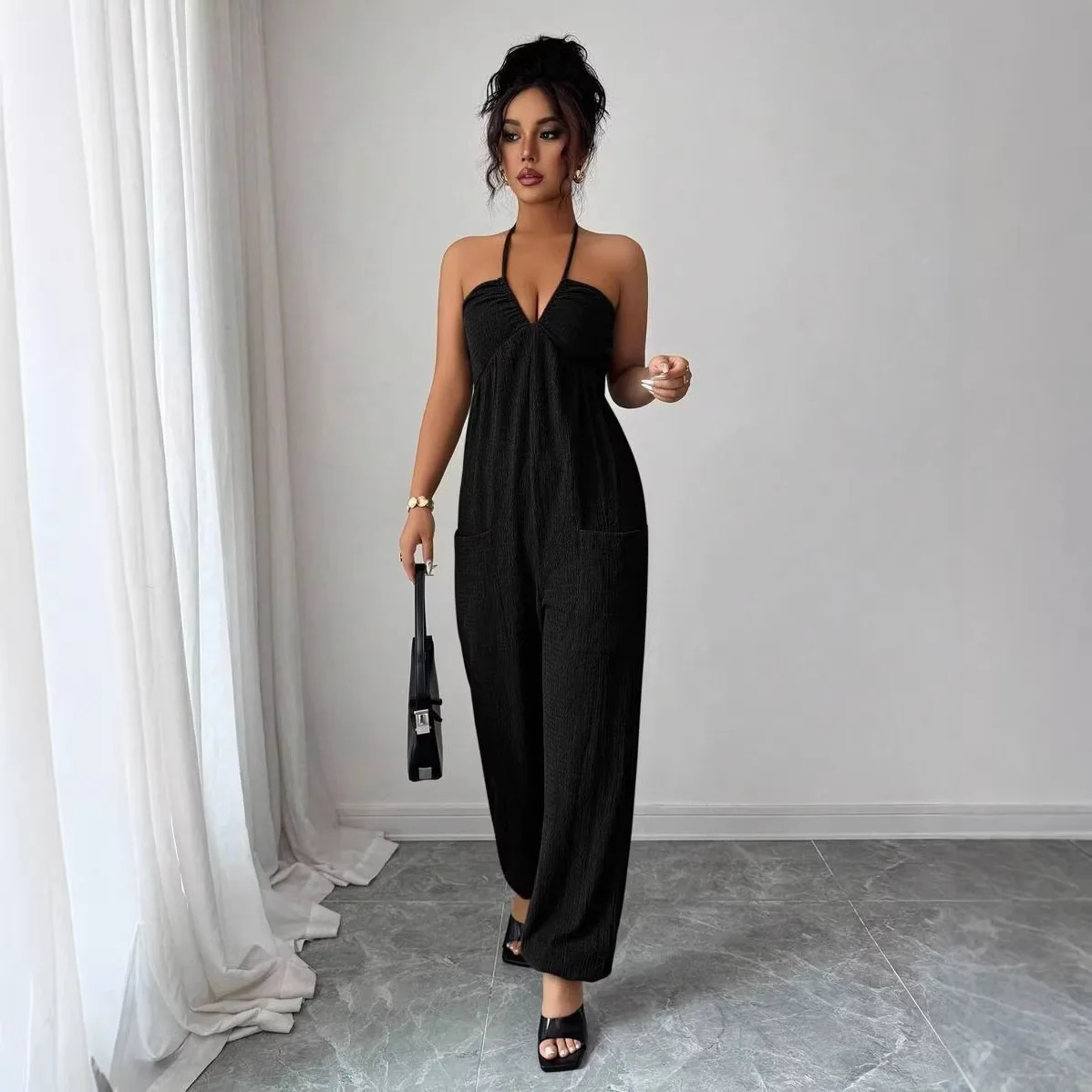 

2026 New Style Women's Sleeveless Backless Solid Color Thin Strap Jumpsuit with Pockets for Spring and Summer