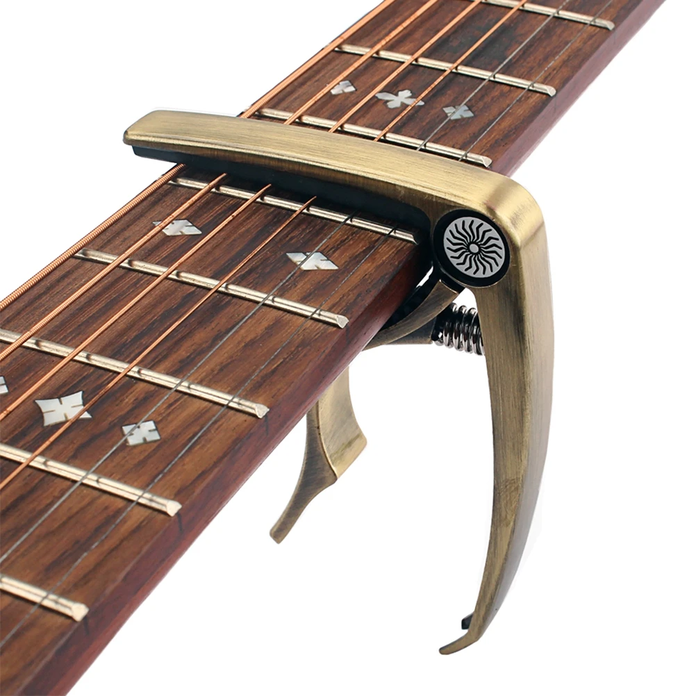 

Guitar Capo Tune Clamp Key Trigger Capo Clip-on Tuner for Acoustic Electric Guitar/ Ukulele/ Banjo/ Mandolin ( -black)