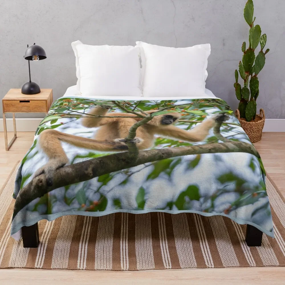 White-handed gibbon on Fig Tree Throw Blanket