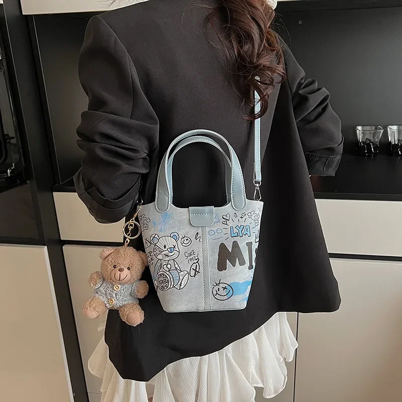 

​​"2025newDoodleCore Cylinder Bucket Bag Women | PopArt Bear Market Purse - French Riviera Basket Crossbody Multi-Carrier"​​