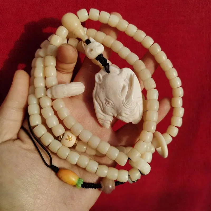 9*8mm , straight-cut 108 beads per bracelet featuring exquisite bone patterns paired with amber and purple hemat