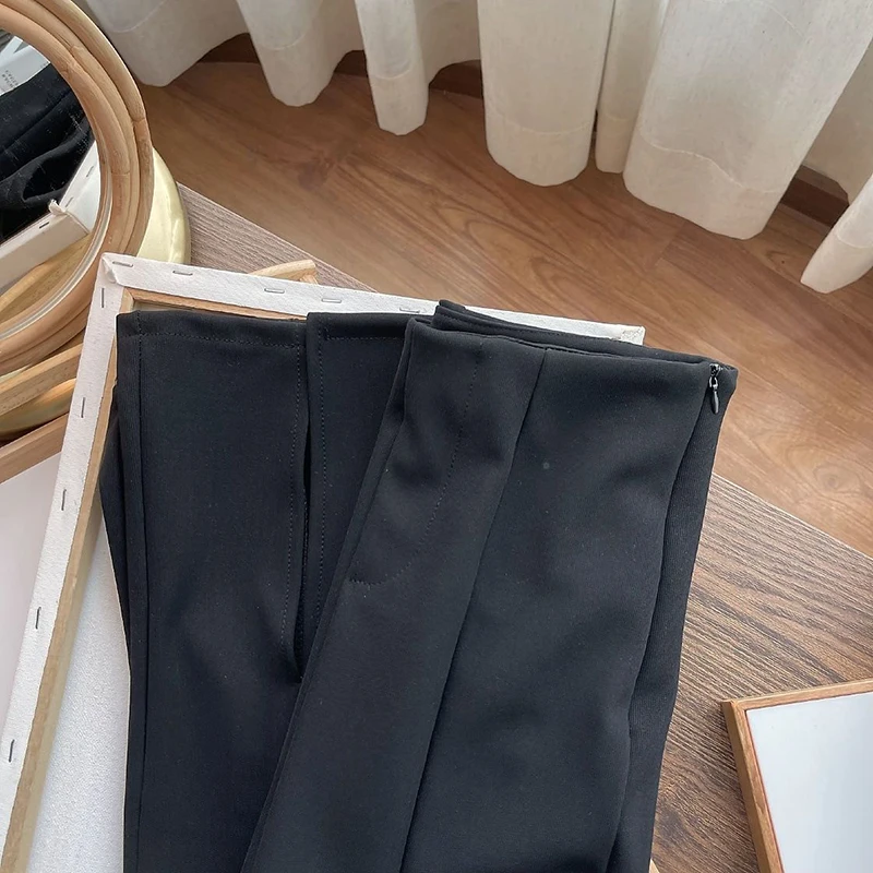 Pantaloni svasati con spacco streetwear Pantaloni da donna coreani neri a vita alta Pantaloni da ufficio da donna alla moda eleganti pantaloni slim divisi tutti abbinati
