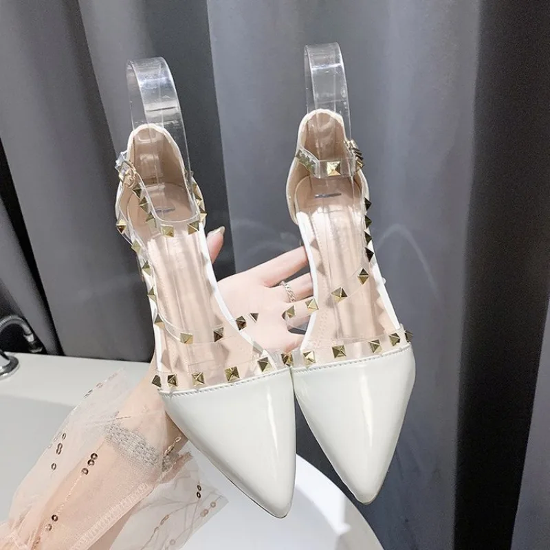 Pointed rivet sandals women\'s spring and summer 2024 new all-match thin transparent one-word buckle belt thick heel square root