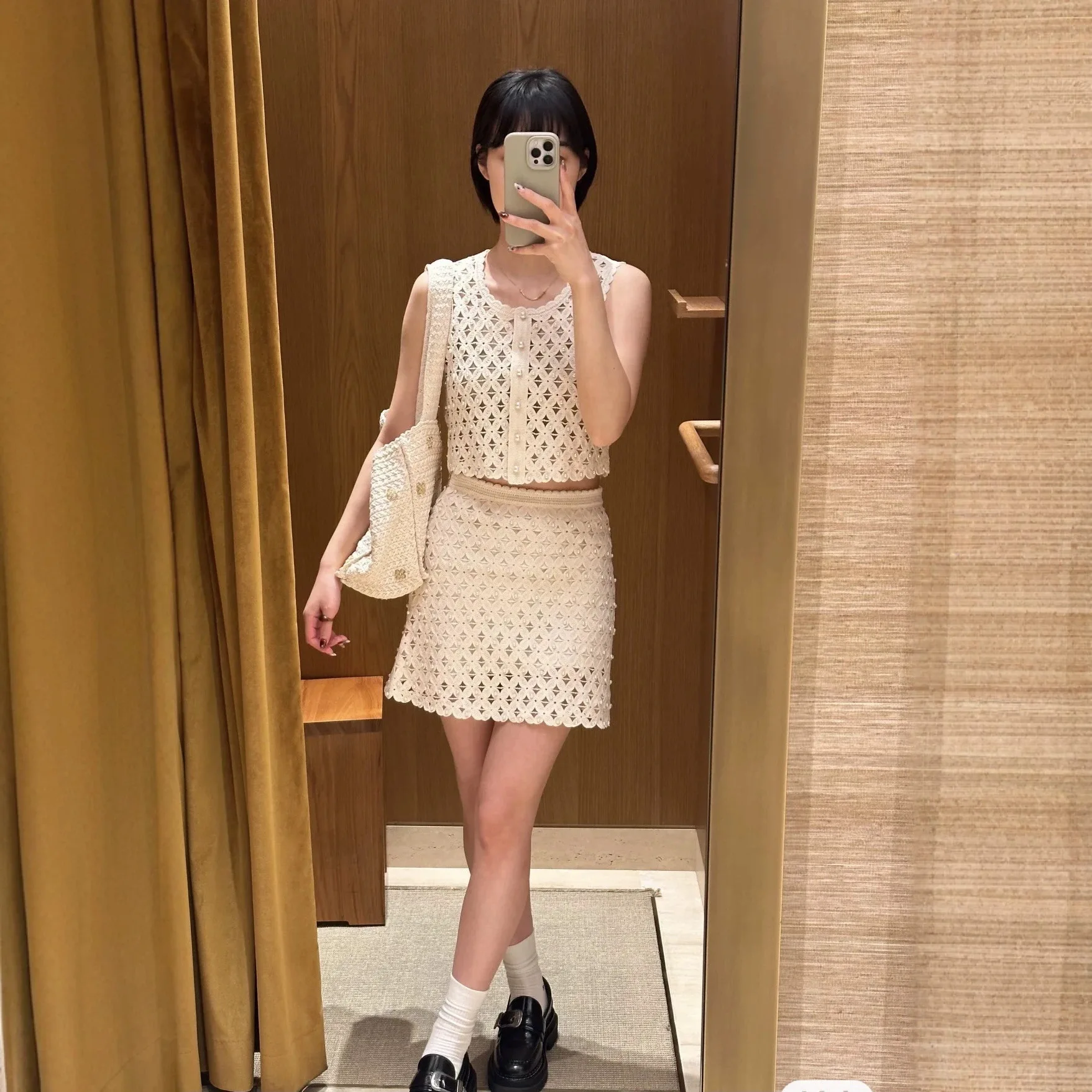 

Women's Solid Color Set with Crochet Four Leaf Pattern Hollow Out Pearl Sleeveless O-neck Vest Top + Mini Skirt 2026 Summer New