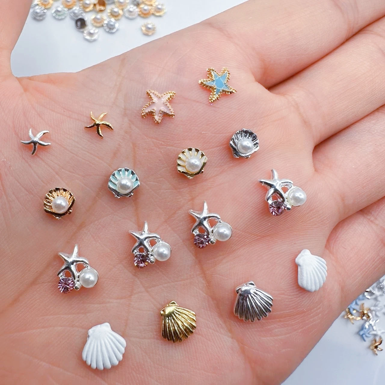 10szt Summer Nail Art Rhinestones Ocean Shell Pearl Star Nail Art Charms Akcesoria Luksusowe kryształowe metalowe ozdoby do paznokci Części