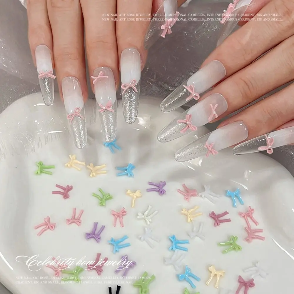 50 szt. Kokardki do zdobienia paznokci, kokardki w jednolitym kolorze, trójwymiarowe ozdoby do paznokci, kolorowe wstążki, różne rozmiary, narzędzia do zdobienia paznokci.