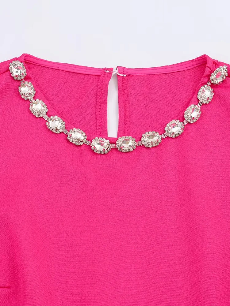 New European-style women's fashion set: stylish and versatile top and skirt set with elegant rhinestone embellishments.