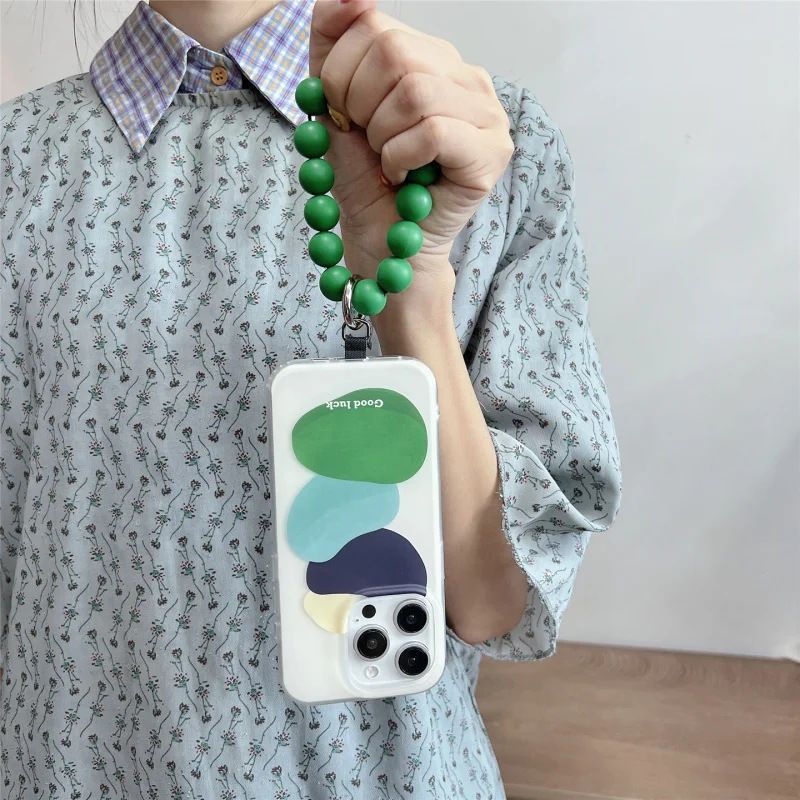 

Green geometric color block phone case suitable foriphone15promax，Beaded Wrist Portable Niche Anti-drop