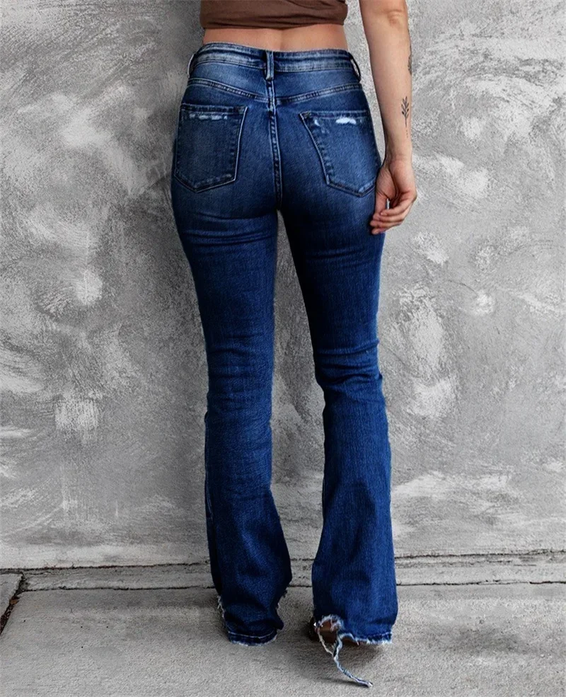 Vintage zepsute dziury rozkloszowane dżinsy Streetwear wysokiej talii zmywalne bawełniane spodnie dżinsowe spodnie z guzikami dla kobiet w nowym amerykańskim stylu