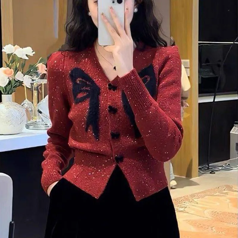 Autumn and winter new style French V-neck bow temperament short cardigan long sleeved knitted sweater top women\'s clothing