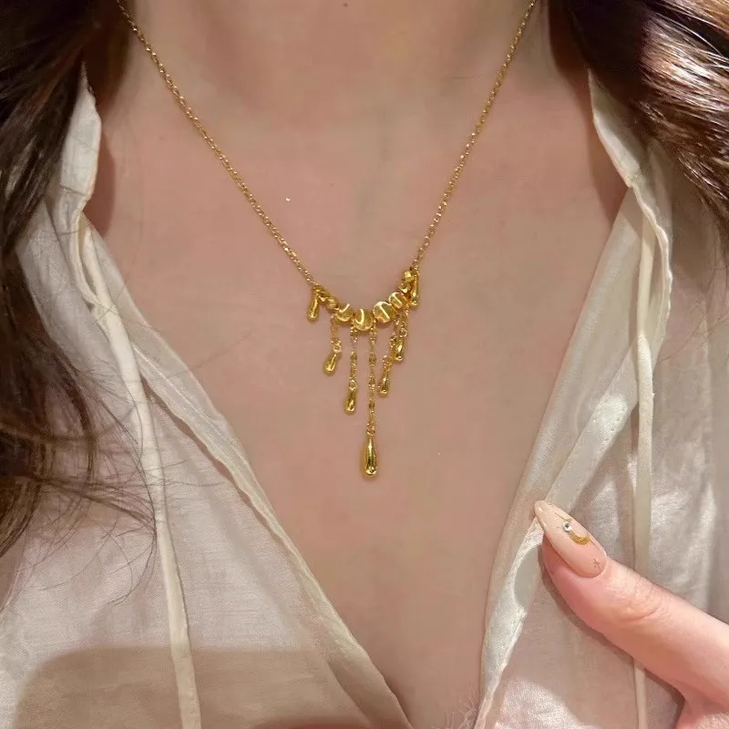 

Luxurious 24K gold drop cat's eye tassel women's light luxury fashionable clubbing bead necklace