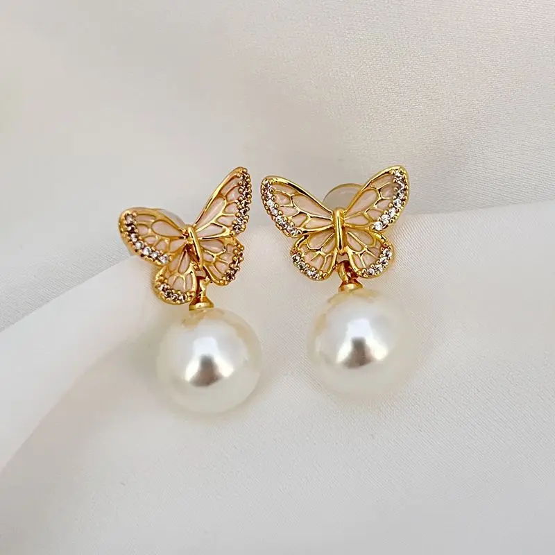 

New Year Fashionable Enamel Craft Light Luxury Pearlescent White Pearl Butterfly Zircon Elegant Lady Style Exquisite Earrings