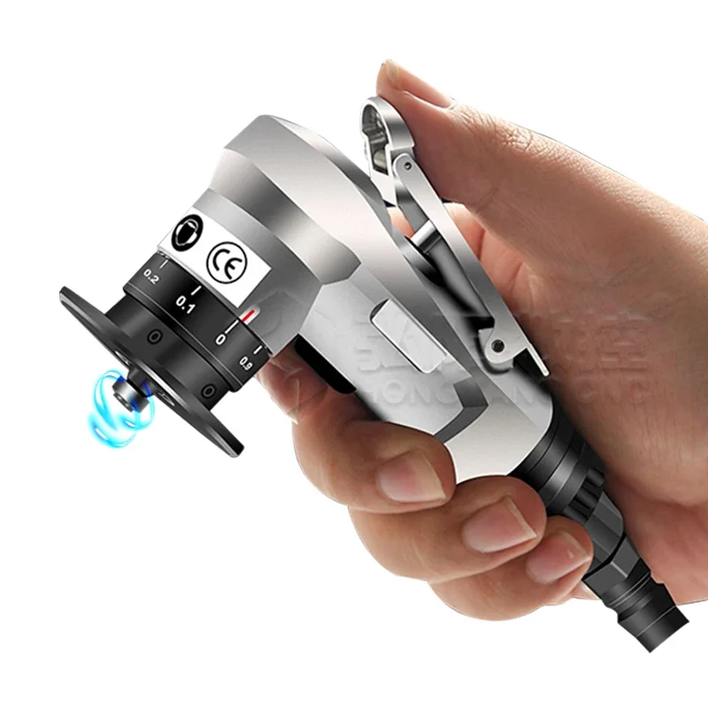 Handheld bevel cutting machine with rotating cutter, for cutting inclined suaces