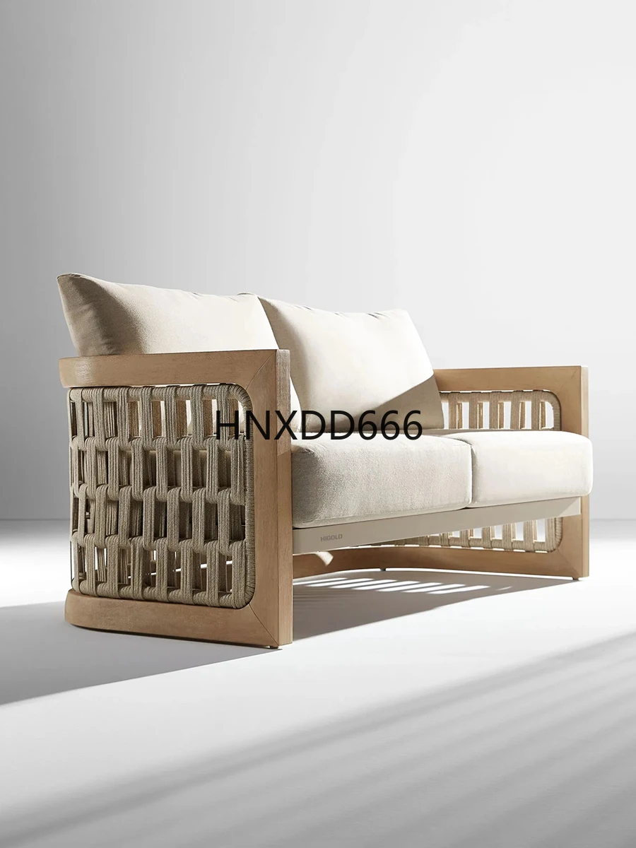 Sofá de exterior, mesa de centro de ratán con patio de teca