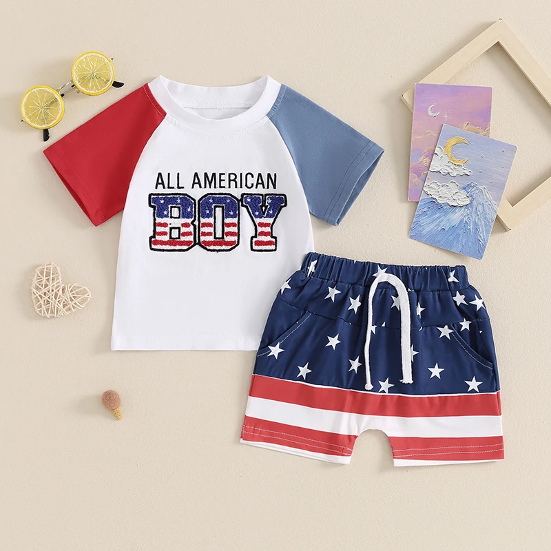 

2024-03-06 Lioraitiin Toddler Boys 4th of July Outfits Letter Embroidery Short Sleeve T-Shirt +Stars Stripes Shorts Clothes Set