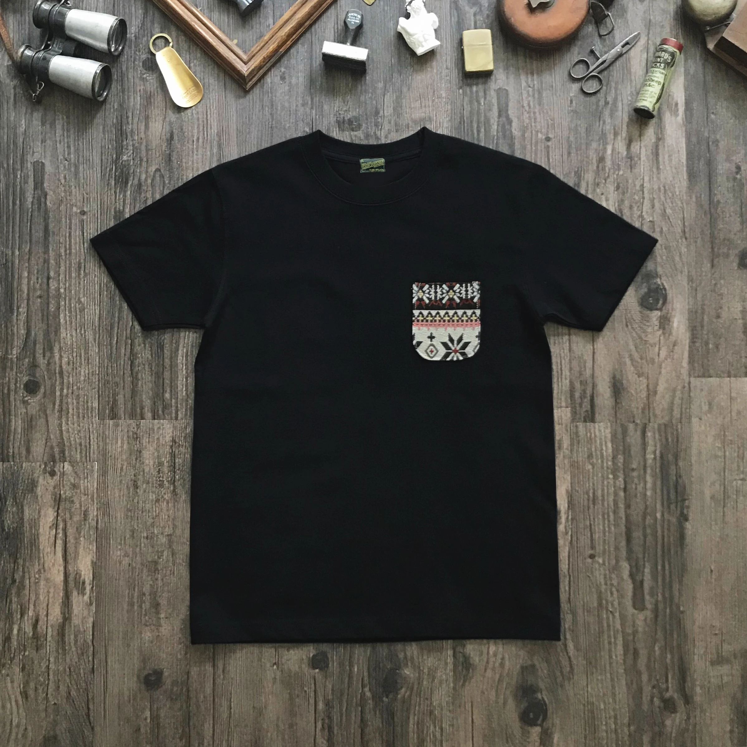 

NVGS Mfg Pocket Tee Black Pocket Crewneck Short Sleeve T-Shirt Ethnic Style Blockbuster American Vintage