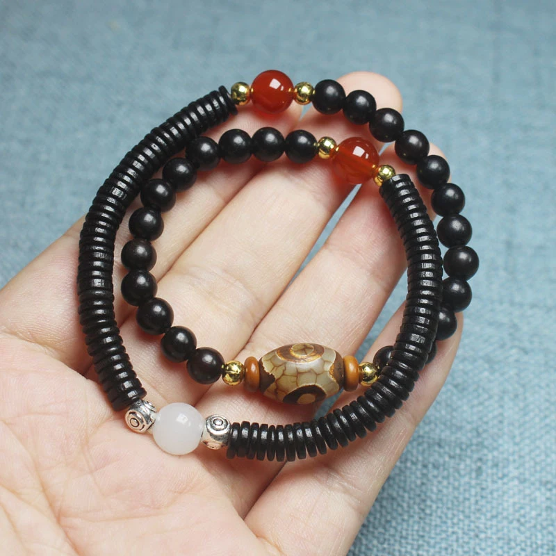 Ancient-style black ebony 6mm double-loop bracelet with Dzi beads, unisex cultural and artistic jewelry