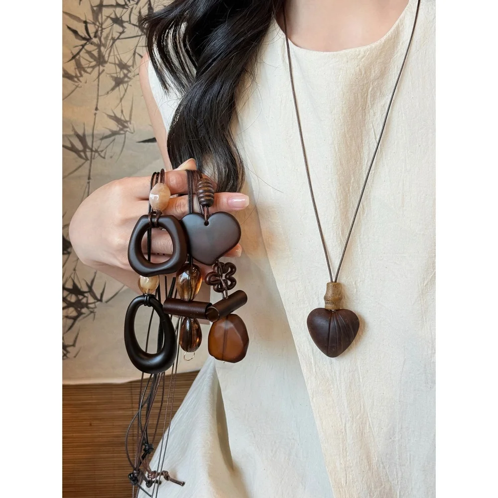 الرجعية الخشب الزجاج قلادة قلادة بولي Leather الجلود الحبل سترة طويلة سلسلة قلادة للنساء مجوهرات الأزياء والاكسسوارات