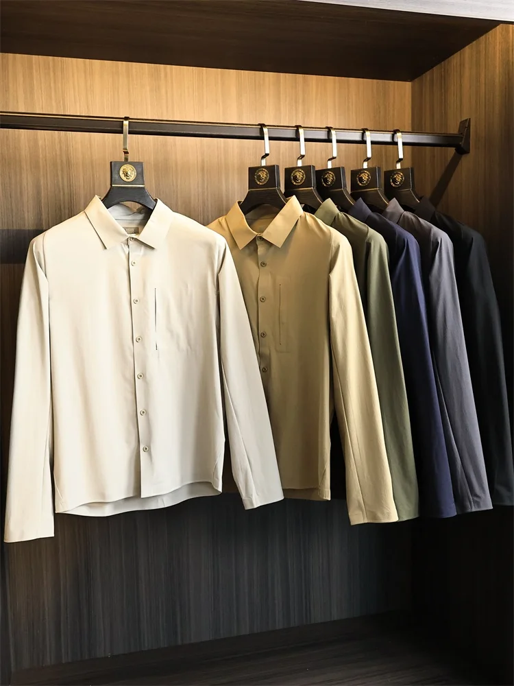 

Элитный Бисин Сле! Высокая смесь нейлона Densi! Осенние мужские уличные поездки на работу с воротником-стойкой Long Sve irt Trendy