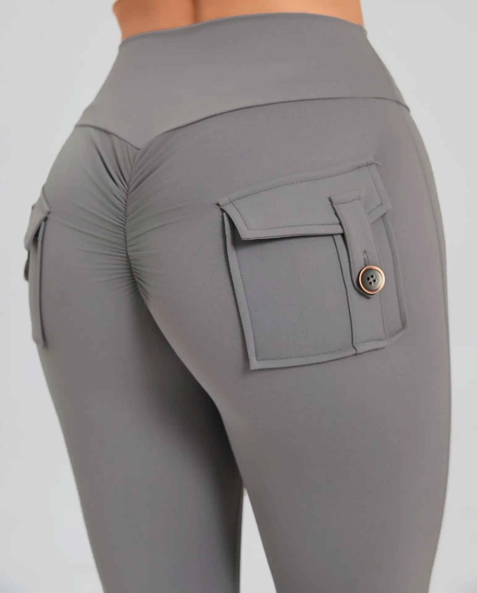 Pantaloni sportivi Casual Scrunch Legging solleva il culo pantaloni Cargo a vita alta da donna con pantaloni da palestra tascabili Leggings svasati per il Fitness