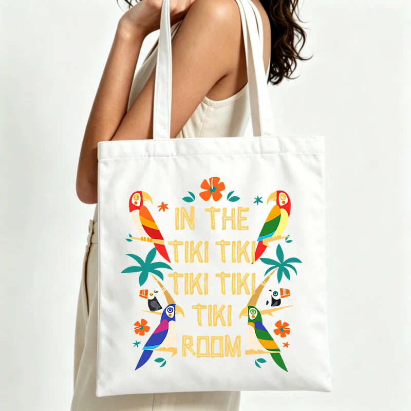 parrot and tropical floral print canvas tote bag with letter graphic, ideal for casual summer outings and daily shopping