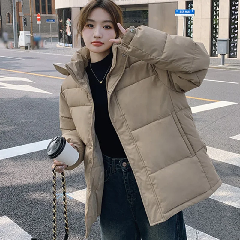 سترة نسائية شتوية عصرية بسحّاب وياقة واقفة وأكمام طويلة سترة نسائية بجيوب بلون سادة مع قلنسوة سترات نسائية