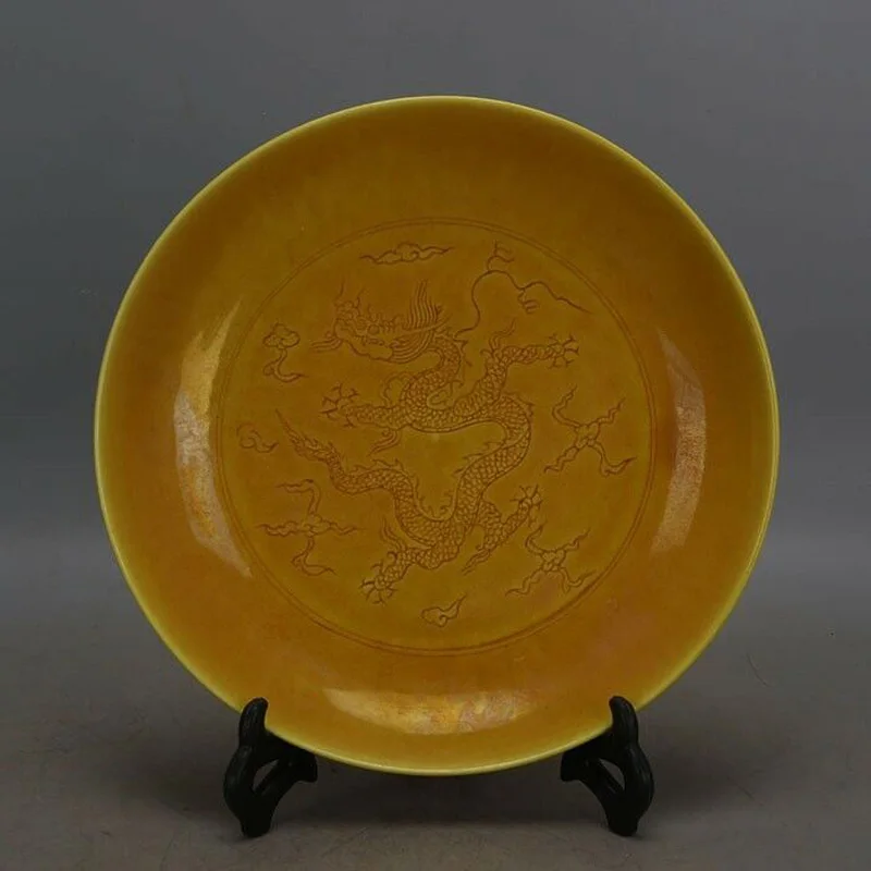 

Old Chinese Porcelain ming Hongzhi marked carved yellow glaze dragon plate 8.9"