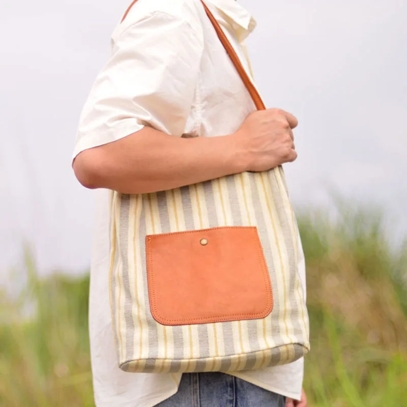 AETOO Nova bolsa de ombro único de couro da moda, sacola de ombro único versátil listrada da moda, masculina de couro simples e w