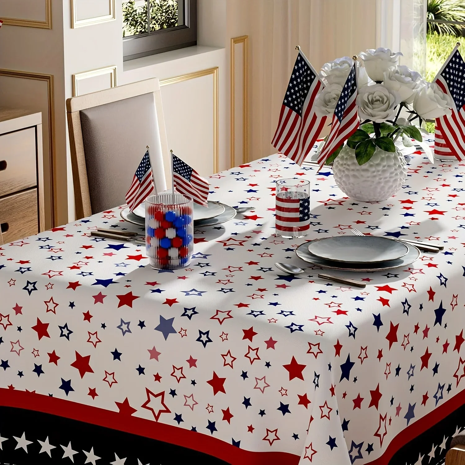 A linen rectangular tablecloth with star stripe design, in red, white, blue and featuring the American flag decoration.yzb
