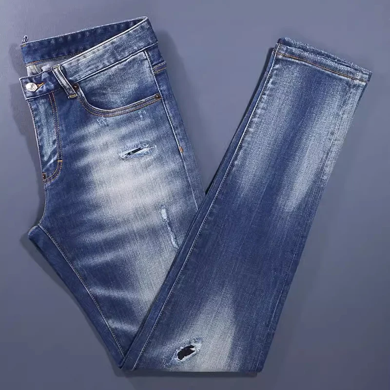 Men Retro Blue Sand‑Blast Faded Wash Minimal Mini Patch Detail Soft Distressed Texture Elastic Slim Denim Jeans Urban Punk Daily