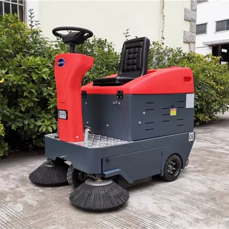 KINGWELL ركوب على آلة كنس المستودعات الكهربائية مكنسة أرضية الطريق الصناعية في الشوارع