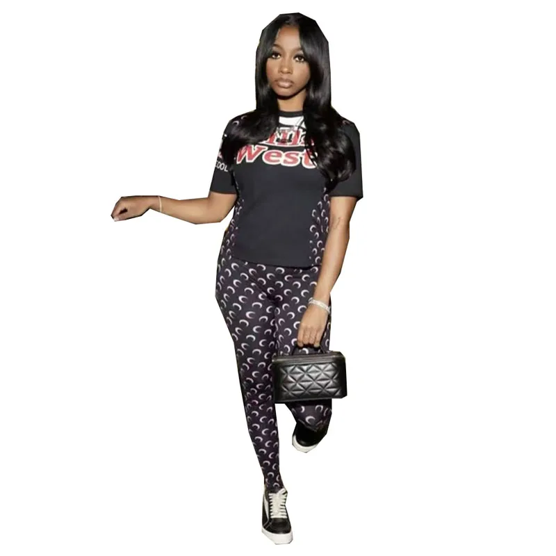 Élégant dame lune lettre imprimé Sport 2 pièces ensemble femmes à manches courtes t-shirt et pantalon ensemble 2026 Sexy Club rue survêtements