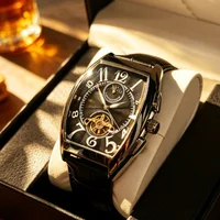 Montre mécanique automatique haut de gamme pour homme, de forme tonneau, design squelette avec fond transparent, bracelet en cuir, montre-bracelet tendance rétro lumineuse et étanche, style polyvalent pour le quotidien professionnel, montre mécanique pour homme au style urbain unique, montre-bracelet de luxe polyvalente et élégante pour homme, choix de cadeau idéal 3