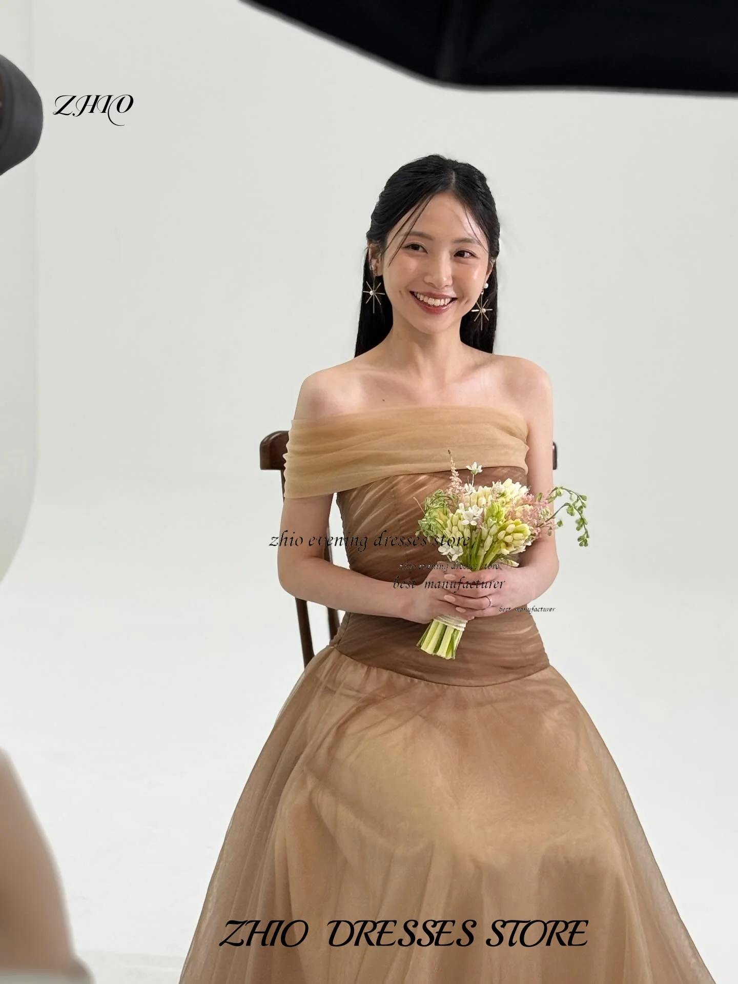 فستان ZHIO مزرف باللون الشامبانيا من التول فساتين كورية بدون حمالات بدون أكمام فساتين مخصصة بطول الأرض فساتين رسمية ستناء