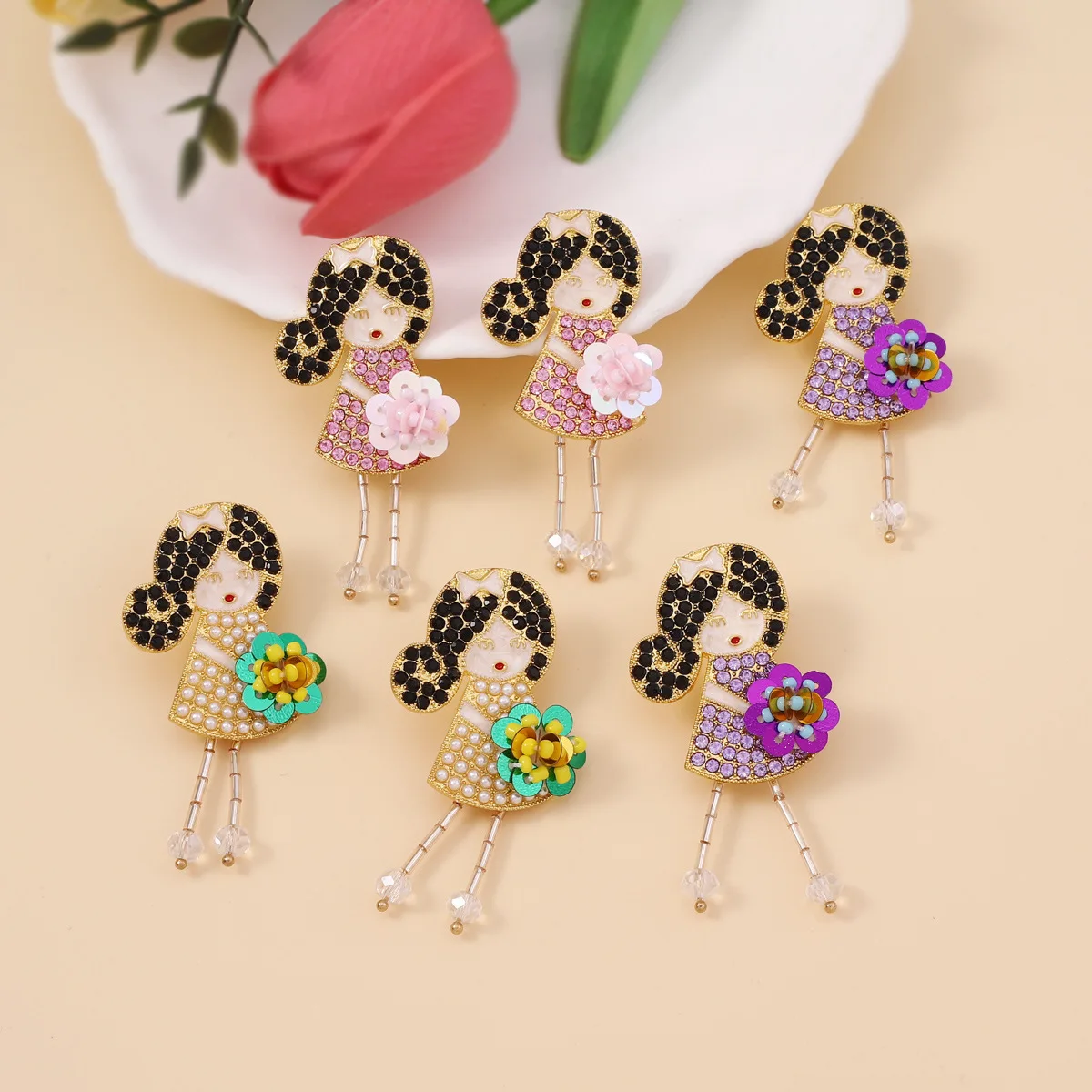 New hot-selling diamond-encrusted bouquet cartoon girl design women's stud earrings niche firming cute temperament earrings
