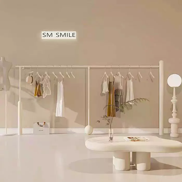Clothes display rack Women's clothing store Cream beige wall hanger Clothing store display rack