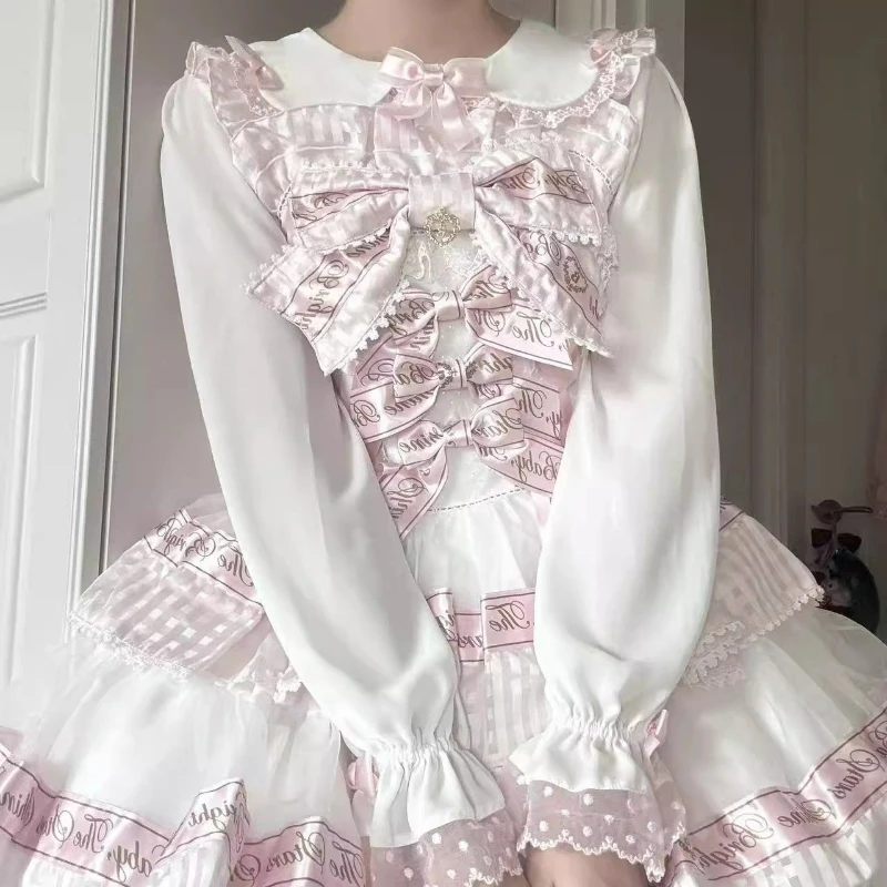 

Японские винтажные блузки в стиле сладкой Лолиты для женщин: милые, с бантом, кружевными вставками, воротником Питер Пэн, длинными рукавами, свободные, в стиле кавайи