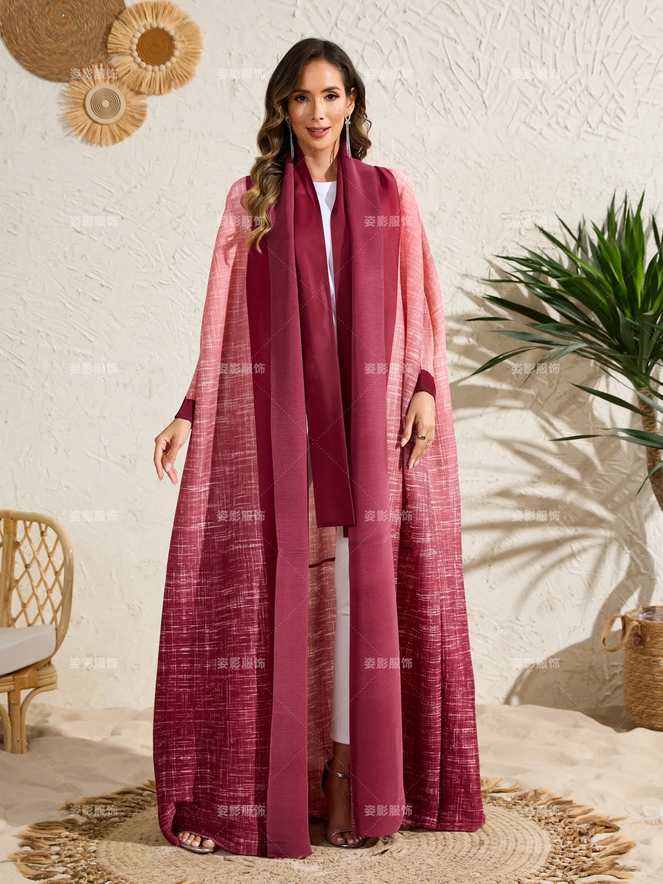 

2025 Muslim robe women's clothing Miyake fold gradual change printed cardigan jacket bat long sleeve loose coat summer new