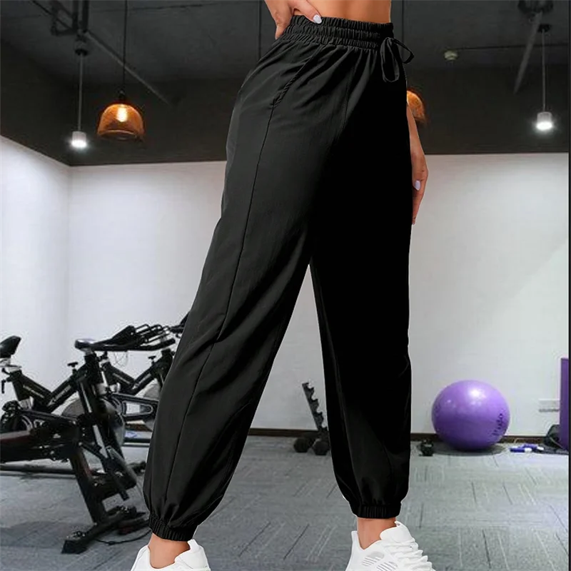 Lockere Lauf- und Fitnesshose, Damen-Sporthose mit Seitentaschen, Outdoor-Freizeithose, Yoga-Hose mit Knöchelbündchen – Detail 10